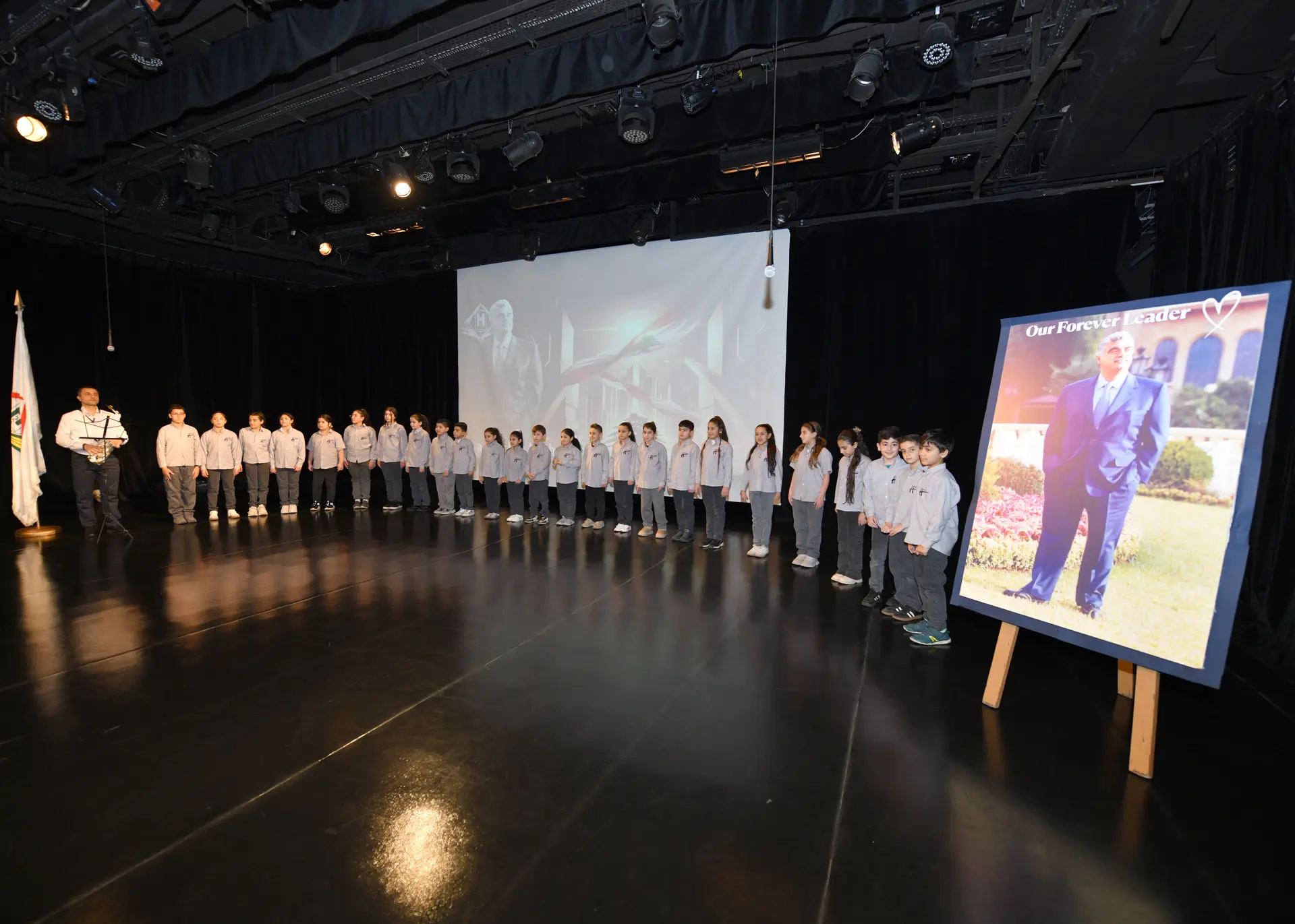 Students taking part in a large school stage production