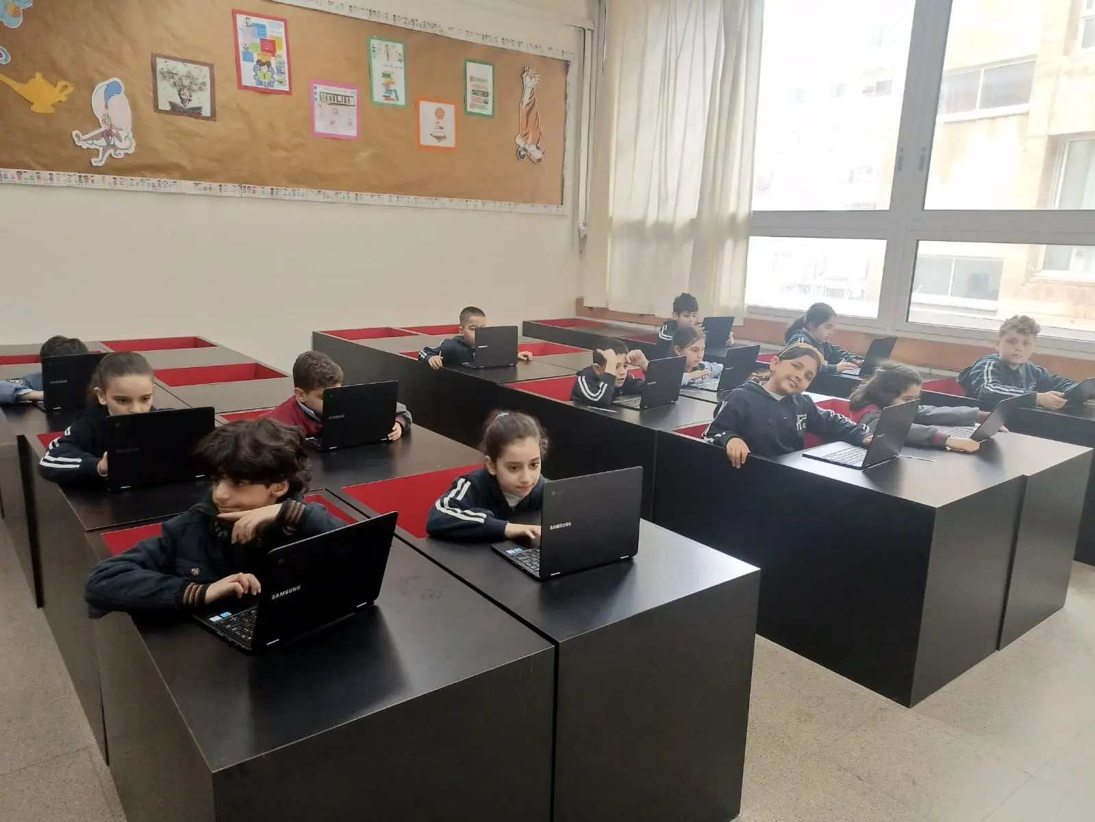 Students learning with technology in a school lab